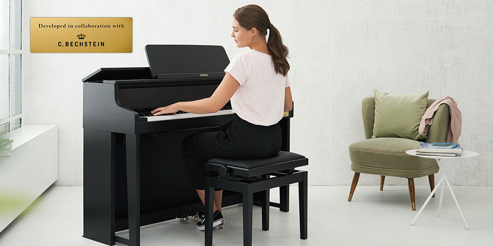 Piano điện Casio GP-300 là mẫu đàn piano điện cao cấp, thuộc dòng CELVIANO Grand Hybrid của hãng CASIO. Đàn được trang bị công nghệ âm thanh AiR mô phỏng như những âm thanh của các cây đàn đại dương câm nổi tiếng.  Ngoài ra, bàn phím nặng của Piano điện Casio GP-300 sẽ cho bạn cảm giác như chơi trên cây đàn piano cơ chuyên nghiệp cũng như chức năng Play Concert cho bạn cảm giác như chơi với một dàn nhạc giao hưởng tại nhà.  Review chi tiết Piano điện Casio GP-300 Âm thanh và đặc tính riêng của từng nhạc cụ được tái tạo một cách trung thực  Piano điện Casio GP-300 tái tạo thậm chí cả những sắc thái tinh tế của những chiếc đàn piano được ngưỡng mộ nhất thế giới. Ba chiếc đàn piano có nguồn gốc từ Berlin, Hamburg và Vienna đã được chọn cho dự án này.  CASIO đã dày công nghiên cứu và phân tích những đặc điểm độc đáo của mỗi cây đàn piano. Piano điện Casio GP-300 mang đến âm thanh tuyệt vời của những cây đàn piano được tái tạo bởi công nghệ tiên tiến của CASIO.  CELVIANO Grand Hybrid sẽ mang đến trải nghiệm sở hữu ba của cây đàn piano tốt nhất thế giới.  Hợp tác phát triển âm thanh đặc trưng  Âm thanh Berlin Grand được phát triển trong sự hợp tác với C. Bechstein. CASIO tìm kiếm âm thanh rõ nét, cân bằng và tinh tế cho CELVIANO Grand Hybrid. D282, kiệt tác tuyệt đỉnh của C. Bechstein là mẫu mà CASIO đã nghiên cứu chuyên sâu để đạt được mục tiêu.  Ông Albrecht, Giám đốc dịch vụ và Nhà chế tạo đàn Piano lành nghề tại C. Bechstein đã đến thăm CASIO R&D để giám sát quy trình phát triển âm thanh cho tới lần sửa cuối cùng.  Thông tin về C. Bechstein  Từ khi Carl Bechstein sáng lập cơ sở sản xuất Pianoforte tại Berlin vào năm 1853, cái tên C. Bechstein đã đại diện cho những cây đàn piano đứng và đại dương cầm cao cấp nhất.  Đàn piano của C. Bechstein được đánh giá cao về chất lượng âm thanh và cảm ứng tốt nhất bởi nhiều nhà soạn nhạc và nghệ sĩ nổi tiếng trong nhiều năm. Trong Thế kỷ 21, C. Bechstein vẫn được công nhận là một trong những nhà sản xuất piano hàng đầu thế giới.  Nguồn âm thanh AiR Grand của Piano điện Casio GP-300  Piano điện Casio GP-300 tích hợp Nguồn âm thanh AiR Grand, một hệ thống mới được phát triển sử dụng công nghệ âm thanh tiên tiến của CASIO.  Nó gồm có nhiều tính năng ấn tượng. Morphing đa chiều mang đến những thay đổi mượt mà giữa nhạc nhẹ và sôi động. Bộ mô phỏng âm thanh tái tạo các đặc điểm âm thanh tạo ra bởi chiếc đại dương cầm truyền thống.  Âm thanh trung thực tạo ra bởi Nguồn âm thanh AiR Grand đảm bảo trải nghiệm đàn piano thuần túy.  Morphing đa chiều  Trên một chiếc đại dương cầm, âm lượng và chất lượng âm thanh thay đổi từ thời điểm chạm vào phím đàn cho tới khi chúng mất đi.  Công nghệ Morphing đa chiều của CASIO cho phép chuyển đổi một cách tự nhiên mượt mà âm lượng và tone dựa trên lực nhấn phím. Công nghệ này góp phần biểu diễn biểu cảm hơn.  Hệ thống cộng hưởng  Các loại cộng hưởng khác nhau trong một chiếc đại dương cầm đều rất quan trọng đối với trải nghiệm chơi đàn. Piano điện Casio GP-300 tích hợp Cộng hưởng dây đàn thể hiện mối quan hệ hài hòa giữa nhiều dây đàn khi nhấn phím đàn.  Cộng hưởng giảm âm cũng tái tạo cộng hưởng xảy ra khi nhấn bàn đạp giảm âm. Hệ thống cộng hưởng của CASIO tái tạo cộng hưởng của cả dây đàn và bảng âm của đại dương cầm bằng cách chọn, kiểm soát và tổng hợp theo điều kiện biểu diễn.  Bộ mô phỏng thả phím  Độ dài âm ngân dài mà một chiếc đại dương cầm tạo ra thay đổi tùy theo tốc độ người chơi đàn thả ngón tay sau khi nhấn phím đàn.  Tương tự, Bộ mô phỏng thả phím của CASIO kiểm soát độ dài các âm thanh này dựa trên tốc độ thả phím. Điều này cho phép người chơi thể hiện những sắc thái tinh tế khi chơi ngắt âm và luyến âm.  Phản hồi đầu cần  Thời điểm phát âm thanh của đại dương cầm thay đổi tinh tế tùy thuộc vào phím nào đang được chơi, ngay cả khi các phím được ấn với cùng một lực.  Để đạt được độ chân thực tối ưu, CASIO đã cài đặt phù hợp cho từng âm trong ba âm của đại dương cầm. Thời gian phát âm thanh cũng có thể được điều chỉnh cho phù hợp với người chơi.  Hệ thống bàn đạp lớn  Bằng cách liên tục dò và phát hiện vị trí của bàn đạp giảm âm, Hệ thống bàn đạp lớn của CASIO cho phép tinh chỉnh âm lượng giảm và độ dài nốt nhạc tùy thuộc vào mức độ nhấn bàn đạp.  Ngoài ra, chức năng Vị trí nửa bàn đạp cho phép điều chỉnh vị trí nhấn giúp giảm âm hiệu quả theo sở thích của người chơi.  Các tính năng Giảm ồn hoạt động bàn đạp và Giảm ồn bộ giảm âm của Hệ thống âm thanh hoạt động, trong trường hợp GP-500BP, tái tạo ngay cả những âm thanh vận hành tinh tế như được trải nghiệm với chiếc đại dương cầm truyền thống.  Bộ máy âm thanh lớn  CASIO đã phát triển một hệ thống loa mới dành riêng cho Piano điện Casio GP-300 để tái tạo những đặc điểm của âm thanh phát ra lên trên hoặc xuống dưới từ chiếc đại dương cầm truyền thống.  Hệ thống âm thanh bốn kênh tích hợp sáu loa, được đặt cẩn thận trong một thiết kế kết cấu phát âm thanh ra ngoài từ bên trong thân đàn.  Hệ thống mang lại trải nghiệm trường âm tương tự mà người chơi sẽ được thưởng thức khi chơi đàn đại dương cầm truyền thống.  Vị trí nắp có thể điều chỉnh và Bộ mô phỏng nắp  Thiết kế của Piano điện Casio GP-300 bao gồm bảng trên cùng có thể được nâng lên và hạ xuống bằng tay.  Vị trí nắp không chỉ ảnh hưởng đến âm thanh đến từ loa trên mà còn hoạt động phối hợp với cài đặt “Vị trí nắp” để sao chép chính xác đặc điểm của nắp có thể điều chỉnh trên một chiếc đại dương cầm truyền thống.  Âm lượng và âm sắc của đại dương cầm thay đổi tùy theo mức độ nắp được mở hoặc đóng. Bộ mô phỏng nắp mô phỏng các hiệu ứng âm này bằng điện tử.  Người chơi đàn piano có thể chọn trong số bốn thiết đặt để mở và đóng các giai đoạn và tận hưởng việc chơi nhạc với hiệu ứng âm thanh đàn piano theo lựa chọn của mình  Bộ mô phỏng hội trường và Vị trí nghe  Bao gồm 12 loại Bộ mô phỏng hội trường; từng loại dựa trên phân tích cẩn thận về đặc điểm âm thanh của địa điểm hòa nhạc nổi tiếng thế giới. Mỗi không gian có tổng bốn cài đặt Vị trí nghe.  Ví dụ: người chơi đàn có thể mô phỏng trải nghiệm nghe đàn piano từ ghế khán giả, ngược lại với vị trí chơi đàn.  EQ đồng bộ âm lượng  EQ đồng bộ âm lượng đặc biệt hữu ích để chơi đàn yên tĩnh tại nhà và những lúc khác khi bạn muốn giữ âm lượng loa thấp. Chức năng này cân bằng âm thanh Piano điện Casio GP-300 ở âm lượng thấp bằng cách điều chỉnh chất lượng âm thanh ở quãng âm thấp và cao. Kết quả là trải nghiệm chơi đàn luôn dễ chịu cho dù âm lượng được đặt ở mức nào.  Chế độ tai nghe  Chế độ tai nghe tự động tạo hình ảnh âm thanh rộng lớn khi đeo tai nghe, tái tạo cảm giác chơi đàn piano truyền thống. Với trải nghiệm đeo tai nghe được nâng cao đáng kể, người chơi có thể tận hưởng việc chơi đàn tự nhiên và cảm nhận trường âm của chiếc đại dương cầm truyền thống.  Chạm phím tinh tế cho Buổi biểu diễn chân thực Sự chân thực bắt đầu từ lần chạm đầu tiên  Chuyển động của người chơi được biến đổi thành âm nhạc với nhiều yếu tố quan trọng. Yếu tố hữu hình nhất là phím đàn. Piano điện Casio GP-300 mang đến âm thanh chân thực từ lần chạm đầu tiên.  Bàn phím hoạt động dạng gõ lớn tự nhiên mới được chế tạo với những phím đàn bằng gỗ có đủ chiều dài. Cơ chế mới của bàn phím tích hợp búa đàn thực thụ đi theo đường chuyển động như trong đại dương cầm dùng trong ban hòa nhạc.  Khi nhấc nắp lên, bạn có thể thấy búa đàn chuyển động qua bảng rõ ràng khi bạn chơi đàn. Vượt xa cơ chế âm thanh chuẩn, hoạt động mới này cho phép lặp lại nốt nhạc nhanh hơn đàn piano truyền thống trong khi vẫn duy trì cảm ứng piano thực sự.  Bàn phím hoạt động dạng gõ lớn tự nhiên  Đối với cảm ứng piano thực sự, CASIO đã phát triển hệ thống bàn phím mới gọi là “Bàn phím hoạt động dạng gõ lớn tự nhiên”. Hệ thống bàn phím này có các phím đàn bằng gỗ có đủ chiều dài cũng như búa đàn đi theo đường chuyển động như trong đại dương cầm dùng trong ban hòa nhạc.  Piano điện Casio GP-300 có các phím đàn được chế tạo bằng những vật liệu giống như đại dương cầm truyền thống. Chúng tôi chú ý cẩn thận tới không chỉ lớp phủ bề mặt của phím đàn mà còn tới cả chất lượng gỗ làm nền phím.  Sự kết hợp cơ chế hoạt động tuyệt vời và chất lượng vật liệu bàn phím vượt trội giúp tăng cảm giác chơi đại dương cầm truyền thống.  1. Cơ chế hoạt động ba cảm biến gốc  Cơ chế hoạt động độc quyền của CASIO tạo ra cốt lõi hoạt động bàn phím của Piano điện Casio GP-300. Cơ chế này bao gồm chuyển động búa đàn mô phỏng từ đại dương cầm và ba cảm biến bắt chính xác thể hiện của người chơi từ phím đàn.  Do không có dây đàn, hoạt động của CASIO có thể vượt quá đặc điểm biểu diễn của một chiếc đại dương cầm, mang lại khả năng chơi vượt trội giúp người chơi dễ dàng thực hiện các thao tác như láy rền và âm luyến láy.  2. Chất liệu bề mặt bàn phím  Việc sử dụng nhựa acrylic cho các phím trắng và phenol cho các phím đen, cùng loại nguyên liệu mà chiếc đại dương cầm hiện đại sử dụng. Điều này tạo cảm giác dễ chịu và thân thuộc. Người chơi sẽ cảm thấy thoải mái và tự tin trên phím đàn của Piano điện Casio GP-300.  3. Khoảng cách điểm tựa từ phím đàn  Vị trí điểm tựa so với phím đàn giống y như chiếc đại dương cầm. Điều này góp phần biểu diễn ổn định bởi vì lực chạm sẽ không bao giờ nặng hơn hay nhẹ hơn tùy vào vị trí ngón tay nhấn phím.  Bàn phím được chế tạo bằng gỗ vân sam chất lượng cao của Áo giống như bàn phím trên đại dương cầm C. Bechstein. Chúng tôi chú ý cẩn thận tới việc sấy và xử lý vật liệu chất lượng cao này trước khi bắt đầu kết cấu bàn phím.  Bàn phím được phát triển để đảm bảo biểu diễn piano vượt trội bằng cách xem xét riêng từng phím trong số 88 phím và cách chúng hoạt động với nhau thành một bộ phận. Chúng tôi cũng theo đuổi sự hoàn hảo của bàn phím qua việc chú ý tới các yếu tố như thay đổi lực ấn và tốc độ thả phím.  Ngoài việc đơn giản phát hiện lực nhấn phím chung, toàn bộ hành trình phím đàn được mô phỏng chính xác theo hành vi của chiếc đại dương cầm  Trải nghiệm Grand Hybrid vượt xa hơn cả việc chơi đàn piano Chơi trong không gian huyền thoại  Piano điện Casio GP-300 gồm Bộ mô phỏng hội trường có nhiều địa điểm biểu diễn đẳng cấp thế giới. Với việc xử lý tín hiệu và phân tích nâng cao, CASIO đã tái tạo đặc điểm âm thanh của các phòng hòa nhạc, nhà hát, nhà thờ và các không gian biểu diễn khác trên toàn thế giới.  Bạn ngay lập tức có thể chọn một trong các cài đặt này, tạo ra một bầu không khí chân thực cho biểu diễn của bạn.  Chơi với một dàn nhạc giao hưởng  Tính năng Biểu diễn hòa nhạc của Piano điện Casio GP-300 mang đến cho bạn vai trò người chơi đàn piano solo với một buổi biểu diễn hòa nhạc. Hệ thống âm thanh đóng vai dàn nhạc đi kèm bạn.  Có các tác phẩm của Tchaikovsky, Pachelbel, Smetana và nghệ sĩ khác. Nhịp của các bản nhạc này có thể được làm chậm để giúp bạn thực hành.  Các tính năng đặc biệt Biểu diễn hòa nhạc  Chơi với một dàn nhạc là một sự kiện vô cùng hồi hộp. Tính năng Biểu diễn hòa nhạc thể hiện biểu diễn hòa nhạc cho nghệ sĩ dương cầm tận hưởng trải nghiệm chơi đàn như nghệ sĩ solo đi kèm bởi một dàn nhạc đầy đủ.  Tích hợp 15 bản nhạc. Khi bạn luyện tập, chức năng phát lại thuận tiện giúp bạn có khả năng chơi, ngừng, tua nhanh, tua lại và lặp đoạn A-B. Dùng Chế độ chậm, nhịp của các bản nhạc này có thể giảm tới 80% tốc độ bình thường khi cần.  Các tính năng linh hoạt khác – Bộ ghi âm  Đàn piano Piano điện Casio GP-300 có khả năng ghi âm biểu diễn trên thẻ nhớ USB hiện có trên thị trường ở dạng tệp âm thanh nổi (định dạng .WAV âm thanh nổi, 44,1 kHz).  Các bản ghi âm có thể được lưu trữ hoặc phát lại trên máy tính hoặc truyền tới đĩa CD hoặc phương tiện khác. Chức năng phát lại toàn bộ tích hợp của đàn piano cho phép sử dụng các tính năng như tạm dừng, tua nhanh, tua lại và lặp lại đoạn A-B.  – Bộ ghi MIDI  Chức năng này cho phép người chơi ghi lại biểu diễn của mình trong bộ nhớ của Piano điện Casio GP-300. Chức năng này giúp người dùng nâng cao kỹ năng chơi đàn bằng cách xem lại biểu diễn của mình một cách khách quan sau đó.  Chức năng phát lại toàn bộ cho phép sử dụng các tính năng như tạm dừng, tua nhanh, tua lại và lặp lại đoạn A-B.  – Thư viện nhạc  Piano điện Casio GP-300 bao gồm 60 bản nhạc piano trong “Thư viện nhạc”. Có bản tổng phổ cho các bản nhạc này và các tính năng của CELVIANO Grand Hybrid rất lý tưởng để học đàn. Phần tay Trái và Phải có thể luyện tập riêng.  Có thể thay đổi nhịp và việc lặp lại đoạn A-B cho phép bạn luyện tập một phần của bản nhạc. Mỗi bản nhạc có âm đặt sẵn nhưng người chơi có thể tận hưởng lựa chọn riêng của mình từ các âm Berlin Grand, Hamburg Grand và Vienna Grand  – Chế độ song tấu  Có thể đặt các phím sang trái và phải của phần trung tâm trên bàn phím thành phạm vi âm giống nhau. Chế độ Song tấu thuận tiện khi hai người chơi, ví dụ như cha mẹ và con cái hoặc giáo viên và học sinh, tập đàn cùng nhau.  – Lớp và phân tách  Chức năng lớp cho phép người chơi đàn piano hòa nhịp hai kiểu âm sắc, trong khi có thể dùng chức năng tách để phân tách âm sắc thành các khối âm trầm hơn và cao hơn.  – Tự động tắt nguồn  Để tiết kiệm năng lượng, Piano điện Casio GP-300 sẽ Tự động tắt nguồn khi nhạc cụ không được chơi trong 4 giờ.  – Giao diện tiện dụng  Có thể điều khiển trực quan Piano điện Casio GP-300 qua bảng điều khiển được thiết kế đơn giản, cẩn thận. Bạn có thể dễ dàng tiếp cận Berlin Grand, Hamburg Grand và Vienna Grand bằng các nút dành riêng cho từng âm piano.  Cùng Piano Fingers thưởng thức âm thanh Piano điện Casio GP-300:
